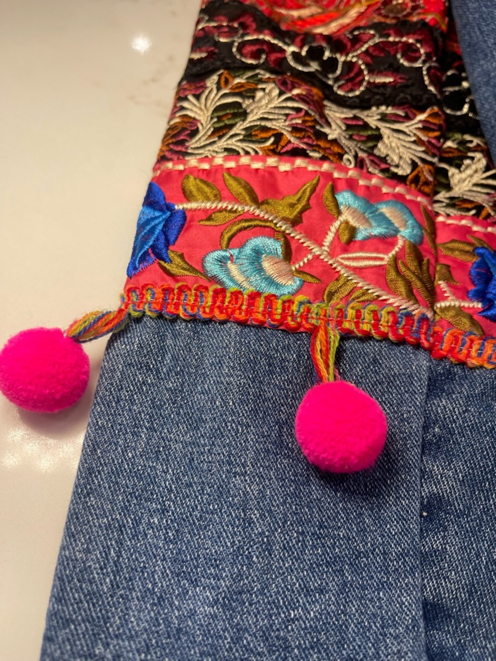 Velzera Women’s Denim Jacket with Multicolor Embroidered Panels and Pom-Poms - Picture 5 of 16